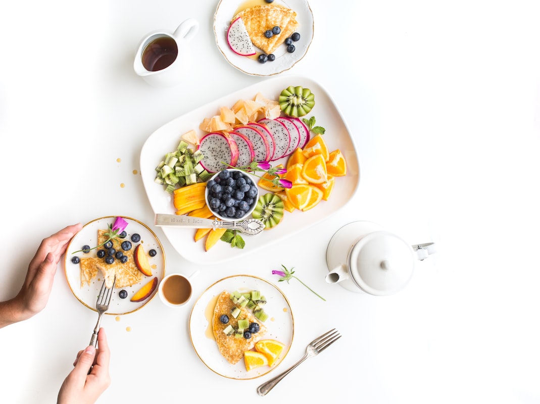 Colorful Buddha bowl with fresh vegetables and tahini sauce