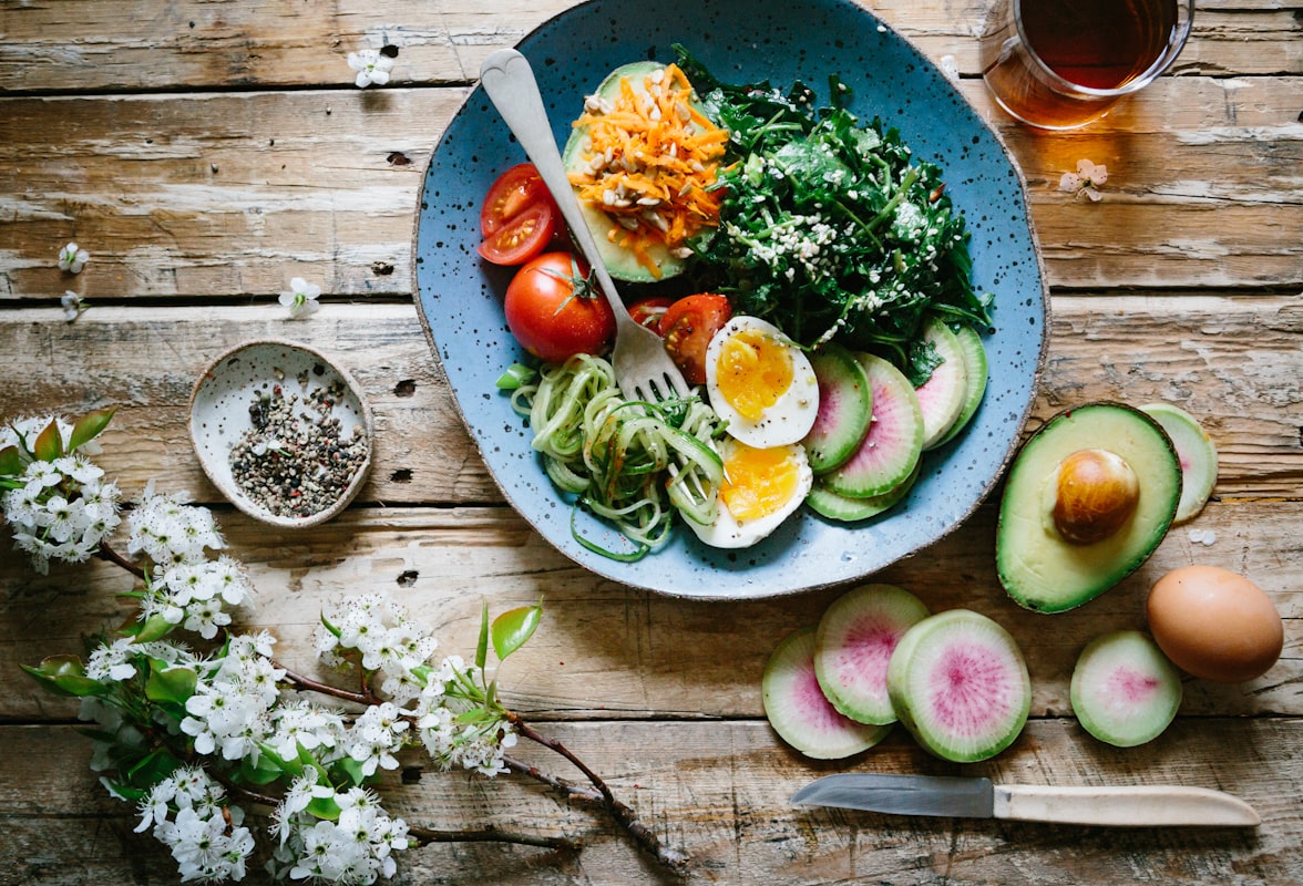 Prepared meal containers with balanced portions and fresh garnish